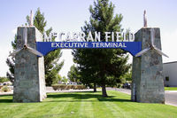 Mc Carran International Airport (LAS) - The McCarran Field Executive Terminal sign that is in front of the Signature Aviation terminal was built in 1941. - by Dean Heald