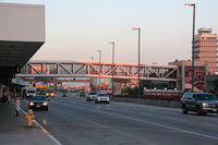 Los Angeles International Airport (LAX) - On the LAX Arrival Level west of Terminal 1 looking east. The old tower is seen in the right side of the photo. - by Dean Heald