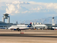 Mc Carran International Airport (LAS) - McCarran's ATCT and the Stratosphere - by Brad Campbell