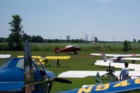 Walter's Agri-center Airport (WI28) - Aircraft on the Ground at Rio Creek Airport during the 2003 Fly-In - by Justin Dauck