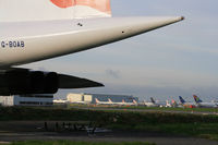 London Heathrow Airport, London, England United Kingdom (LHR) - BA World Cargo Centre seen under Concorde G-BOAB - by Mark Giddens