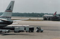 Detroit Metropolitan Wayne County Airport (DTW) - Northwest 747-200 departs in background 1988 - by Florida Metal