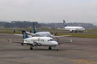 Auckland International Airport, Auckland New Zealand (AKL) - Busy scene at Auckland, with Air NZ's Beech 1900D, Saab 340, and B 737-300 - by Micha Lueck