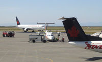 Vancouver International Airport, Vancouver, British Columbia Canada (YVR) - Some incident triggered the fire crew out to Air Canada Jazz's DHC 8 - by Micha Lueck