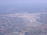 Muskegon County Airport (MKG) - MKG looking east from over the water - by John Woody