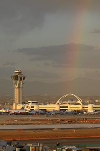 Los Angeles International Airport (LAX) - Rainbow at LAX on a stormy afternoon in February. - by Dean Heald
