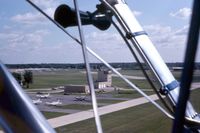 Dupage Airport (DPA) - Flying over runway 10 looking at the old control tower - by Glenn E. Chatfield