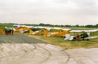 Woodford Aerodrome Airport, Stockport, England United Kingdom (EGCD) - Tiger Moth Line up - Woodford Airshow 1989 (Scanned) - by David Burrell