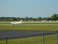 Eagle Creek Airpark Airport (EYE) - A view of runway 03 from the old Lakeside tarmac - by IndyPilot63