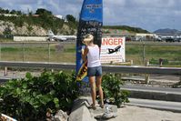 Princess Juliana International Airport, Philipsburg, Sint Maarten Netherlands Antilles (SXM) - New Timetable on Surfboard - by Wolfgang Zilske