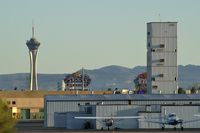 North Las Vegas Airport (VGT) - The end of an era - the old Air Traffic Control Tower at North Las Vegas Air Terminal is being disassembled. Good night and good flight...happy landings! - by Brad Campbell