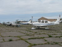 Tangier Island Airport (TGI) - The ramp.  Notice the grass and there are no tie downs.  Bring your own there are cables running down the ramp you can tie to. - by Sam Andrews