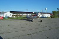 Tangier Island Airport (TGI) - C140 at the edge of parking lot. - by Robert Thomas