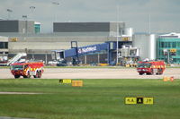 Manchester Airport, Manchester, England United Kingdom (EGCC) - Airport Fire Service on the move. - by David Burrell