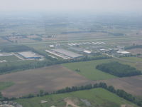 Delaware Municipal - Jim Moore Field Airport (DLZ) - From 2000' MSL on a hazy spring day - by Bob Simmermon