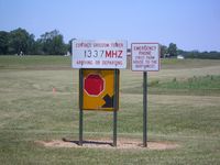 Galveston Airport (5I6) - Signs at the edge of the grass strip - no FBO building. - by IndyPilot63