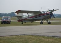 Indianapolis Executive Airport (TYQ) - A polish-built Antonov-2 that is based here...notice the size of the nearby Suburban. - by IndyPilot63