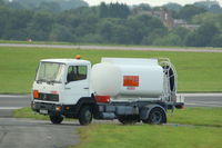 Manchester Airport, Manchester, England United Kingdom (EGCC) - Small Fuel Vehicle - by David Burrell
