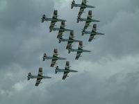 RAF Fairford Airport, Fairford, England United Kingdom (FFD) - Frecci Tricolori displaying at RIAT Fairford 2003. - by Steve Staunton