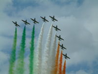 RAF Fairford Airport, Fairford, England United Kingdom (FFD) - Frecci Tricolori displaying at RIAT Fairford 2003. - by Steve Staunton