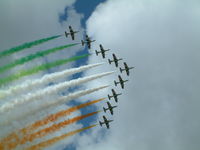 RAF Fairford Airport, Fairford, England United Kingdom (FFD) - Frecci Tricolori displaying at RIAT Fairford 2003. - by Steve Staunton