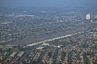 Compton/woodley Airport (CPM) - Entering the traffic pattern at Compton for landing on RWY 25L as seen from our Cessna 172 N62531. - by Dean Heald
