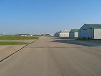Grimes Field Airport (I74) - Ramp and hangers on a fall Saturday morning. - by Bob Simmermon
