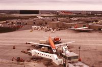 Toronto Pearson International Airport (Toronto/Lester B. Pearson International Airport, Pearson Airport), Toronto, Ontario Canada (YYZ) - YYZ in 1977.Taken from the old terminal 1 carpark.CP Air DC-8-63,with Air Canada DC-8 at the AC Cargo terminal.Background CP Air hangar with CP B747 - by metricbolt