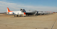 Joint Base Andrews Airport (ADW) - line up of Navy aircraft visiting for Army-Navy football game - by J.G. Handelman