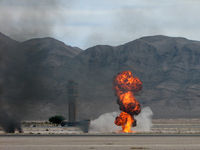 Nellis Afb Airport (LSV) - Nellis AFB ATCT with smoke and fire from mock wargames. Aviation Nation 2007 - by Brad Campbell