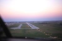 The Eastern Iowa Airport (CID) - Approaching to land Runway 9 in an Apache, I'm just riding along - by Glenn E. Chatfield