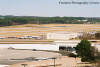 Raleigh-durham International Airport (RDU) - Nice windy day.  It was kind-of boring, There wasn't a whole lot of traffic to be a holiday weekend. - by J.B. Barbour