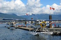 Vancouver Harbour Water Airport (Vancouver Coal Harbour Seaplane Base), Vancouver, British Columbia Canada (CXH) - Harbour Air seaplanes at Coal Harbour (Vancouver Downtown) - by Michel Teiten ( www.mablehome.com )