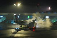 Luxembourg International Airport, Luxembourg Luxembourg (ELLX) - Embraer from Luxair being deiced for an early morning winter flight - by Michel Teiten ( www.mablehome.com )
