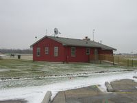 Michigan City Muni-phillips Field Airport (MGC) - The Michigan City FBO with the friendly cat guarding the building... - by IndyPilot63