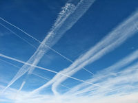 Mc Carran International Airport (LAS) - More of those crazy contrails... - by Brad Campbell