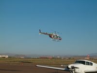 Phoenix Deer Valley Airport (DVT) - A Jet Ranger across the tarmac. - by IndyPilot63