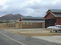 Agua Dulce Airport (L70) - Huge hangars-not crowded. Ranch barn theme. - by Doug Robertson