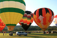 Harmony Balloonport (JY33) - A gaggle of balloons prepares for liftoff at the Warren County Fair. - by Daniel L. Berek