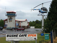 Blackbushe Airport, Camberley, England United Kingdom (EGLK) - Picture taken from the road entrance to Blackbushe Airport - by Terry Fletcher
