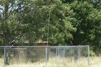 Jack Miller Airport (TS70) - Jack Miller Stolport - Now closed by encroachment and development land fenced and recently sold hanger removed. The only clue as to its former use is a windsock pole.  - by Zane Adams