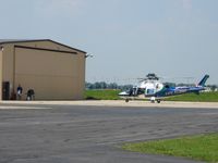 Bluffton Airport (5G7) - Grilling lunch outside the Life Flight hanger - by Bob Simmermon