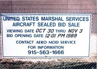 Midland International Airport (MAF) - Auction sign for aircraft at Midland (N7041U - N117GA among others) - by Zane Adams