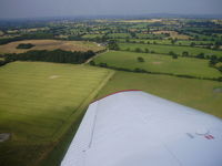 Sleap Airfield Airport, Shrewsbury, England United Kingdom (EGCV) - banking left just after take-off - by chrishall