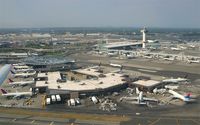 John F Kennedy International Airport (JFK) - Overview of JFK airport with Aer Lingus A330 EI-ORD parked up at Terminal 4 - by Michael Kelly