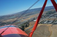 Livermore Municipal Airport (LVK) - Right base to final for 25R at KLVK as viewed from Attitude Aviation's Great Lakes - by B. Hermann