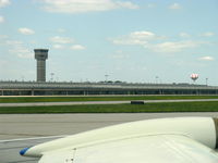 James M Cox Dayton International Airport (DAY) - Several towers on this airport-this is NOT the Air Traffic Control Tower. From N2111Q Beech BONANZA 36 taxiing in - by Doug Robertson