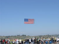Camarillo Airport (CMA) - Opening the Annual Camarillo EAA Airshow with banner tow Old Glory - by Doug Robertson
