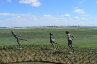 Dallas/fort Worth International Airport (DFW) - Flying kids statues at the new Founders Plaza airport viewing area at DFW - by Zane Adams