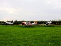Little Gransden Airfield Airport, St Neots, England United Kingdom (EGMJ) - Yaks galore. from left to right G-CBMI, G-BWOD, G-YYAK - by chris hall